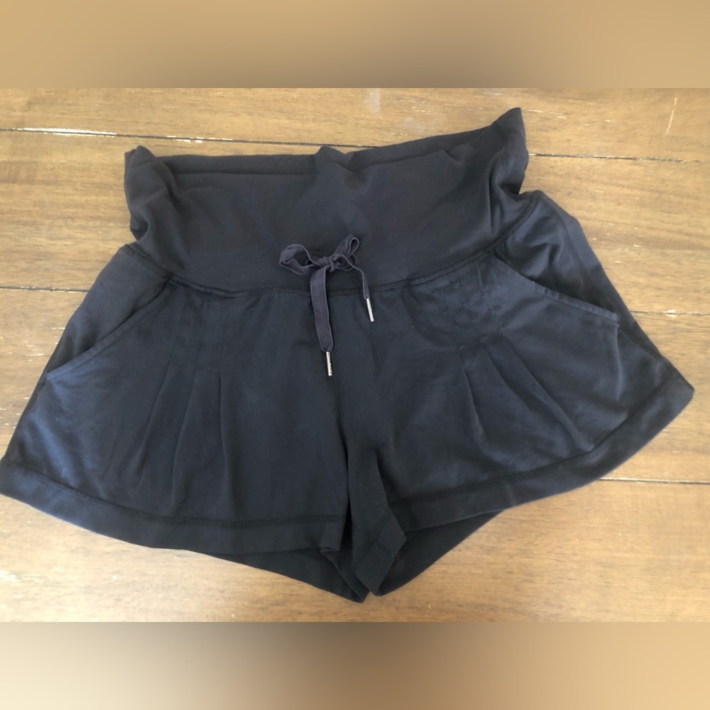 lululemon high-waisted pleated shorts with inner lining 
Size 8 Lululemon Size